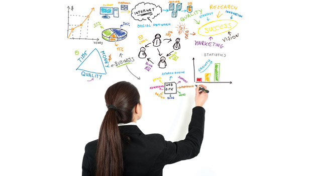maroon business woman drawing white board