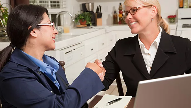 women business handshake
