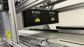 Industrial UV LED curing system mounted on an automated production line.