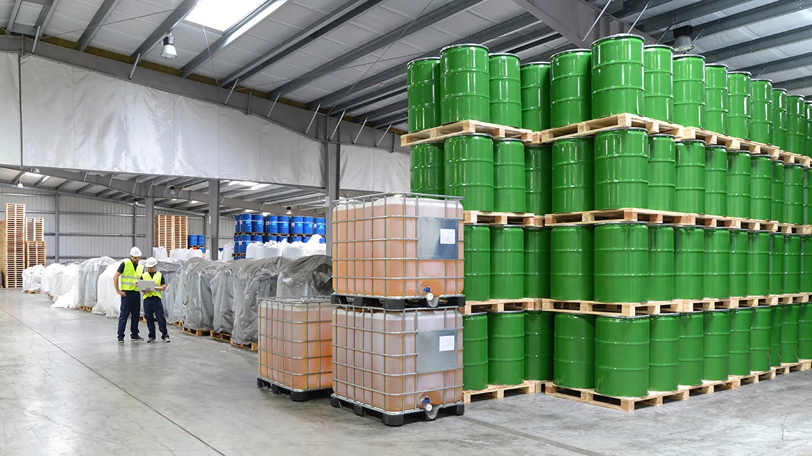 1-GI-956346454-1170x658.jpg Group of workers in the logistics industry work in a warehouse with chemicals