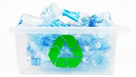 Water bottles with labels in a recycling box