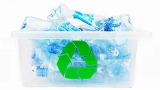 1-GI-157867316-1170x658.jpg Water bottles with labels in a recycling box