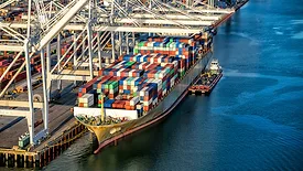 A fully loaded cargo ship docked at the Port of Houston on Galveston Bay, Texas