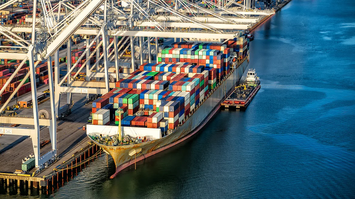 A fully loaded cargo ship docked at the Port of Houston on Galveston Bay, Texas