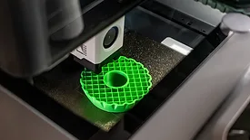 3d printer printing an object on the tray with pla filament, corn starch, non-waterproof filament