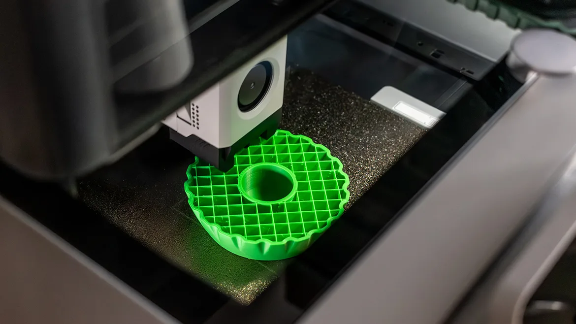 3d printer printing an object on the tray with pla filament, corn starch, non-waterproof filament
