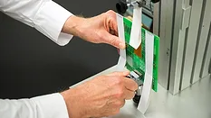 1-Image1-1170x658.jpg Picture of a scientist conducting a peel adhesion test.
