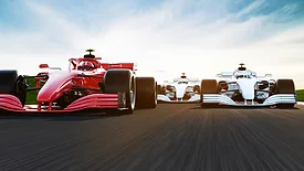  Front view of a fast-moving generic red race car leading group on a race track