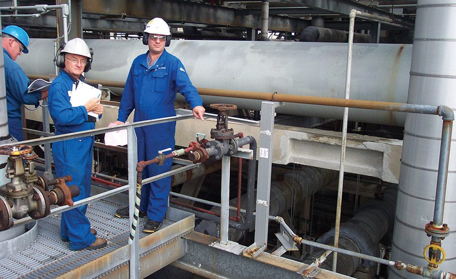 Lanxess workers on platform