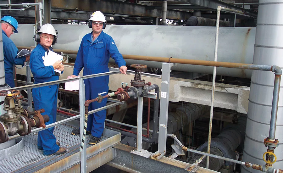 Lanxess workers on platform