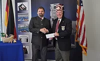 Scheugenpflug-Donates-to-Shriners-Hospital-for-Children.jpg Scheugenpflug-Shriners