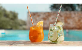 Image of two drinks with paper straws