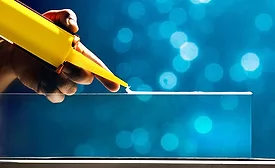 Image of sealant coming out of a tube