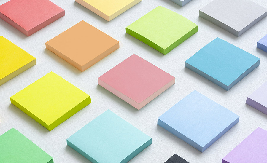 Photo of many colorful Post-it Notes. 