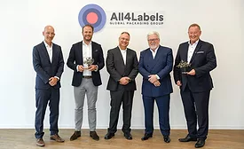 Representatives from All4labels and HP Indigo at agreement signing ceremony