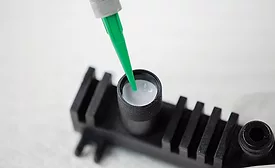 Photo of the application of the Master Bond thermally conductive epoxy