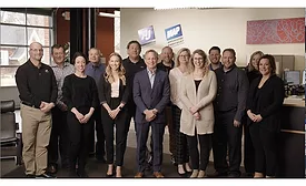 Image of employees of MidAmerica Packaging and AJ Adhesives celebrate the anniversaries