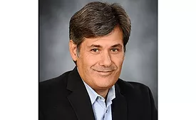 Photo of Igor Zelenovskiy, the new president and CEO of Tailored Label Products.