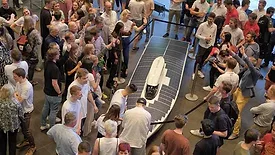 Image of crowd admiring the new Covestro solar racing vehicle