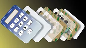 Image of calculator with adhesives in multi-layer assembly