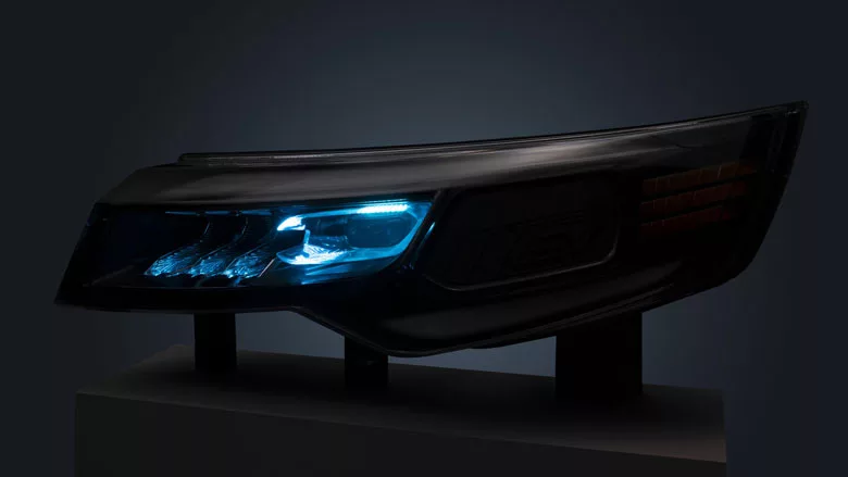 Photo of an automotive headlight with blue light