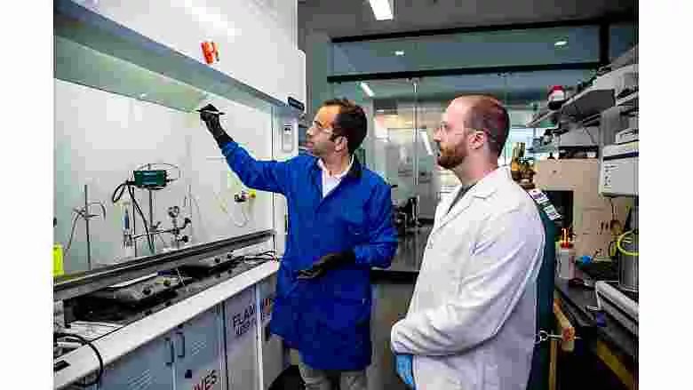 Scott Svadlenak and Kostas Goulas discuss possible reaction mechanisms for the PVC to waxes process. 