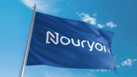 Photo of blue flag with the word Nouryon in white. 