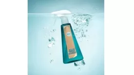 image of spray bottle being submerged in water