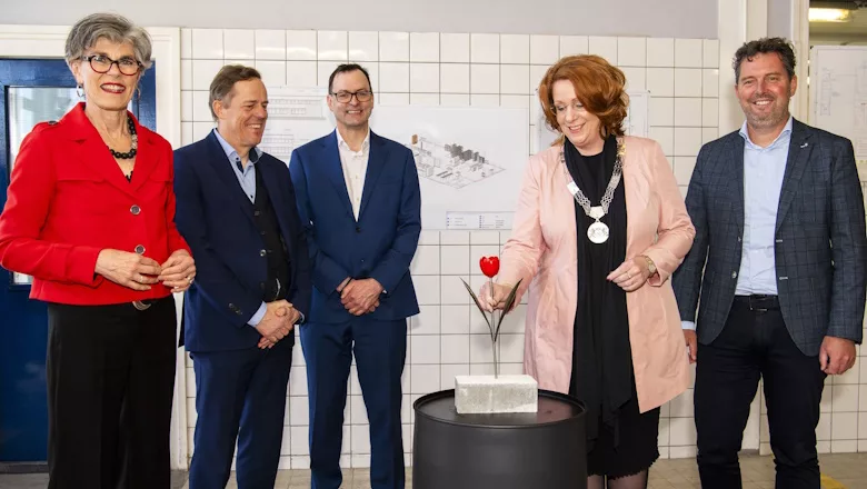 Picture of people marking the opening of a new lab