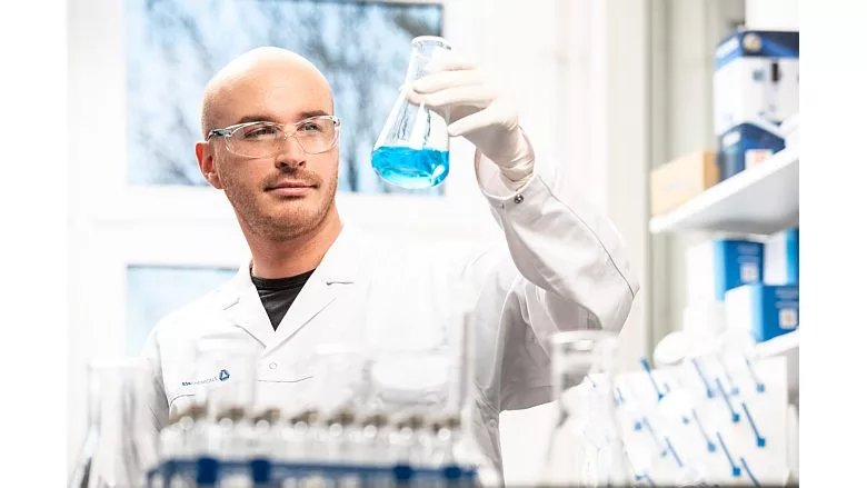 Image of an ASK Chemicals lab technician analyzing chemicals.