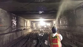 Image of Cem-Kote CW Plus being sprayed to waterproof cement.