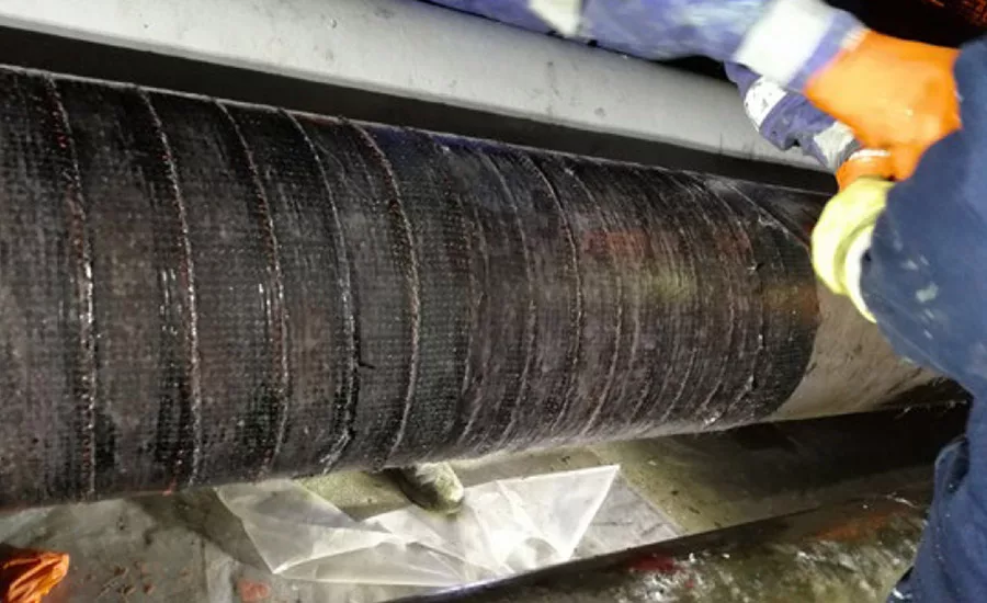 After rebuilding the pipe to original profile using Belzona 1111, several wraps of Belzona 9381 were applied.