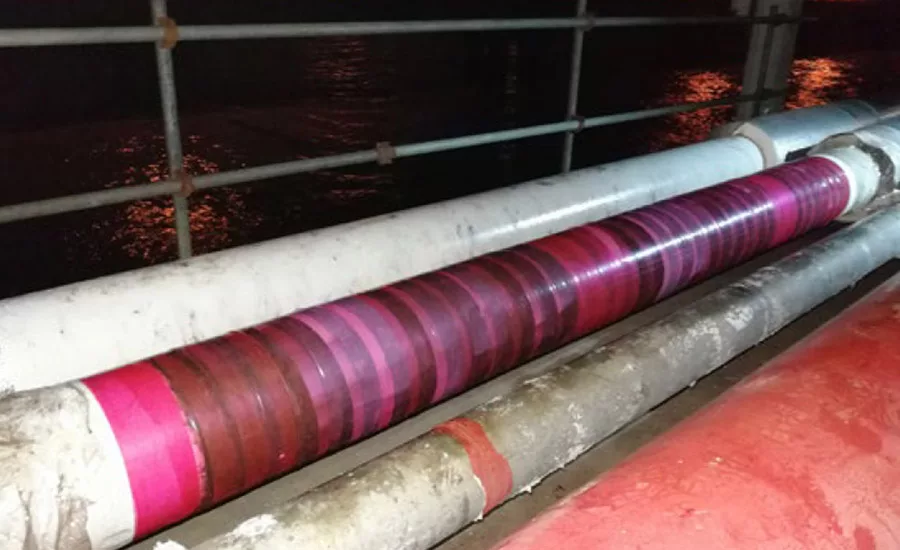 The pipe repair before the removal of the release film.