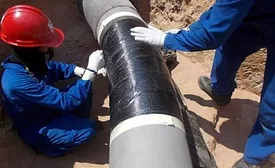 In-field application of Belzona SuperWrap II on a corroded pipeline. Images courtesy of Belzona.