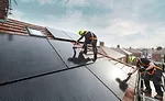 solar panels being installed on roof