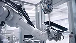 Picture of a Robafoam robot dispensing foam sealant