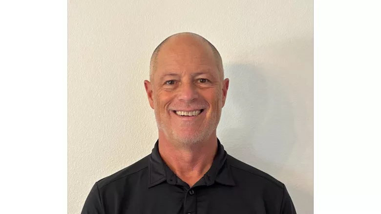 Picture of a man in a black shirt