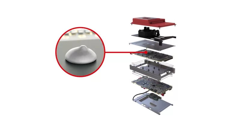 Picture of a white dot of gel and an image showing where it is place in an automotive component
