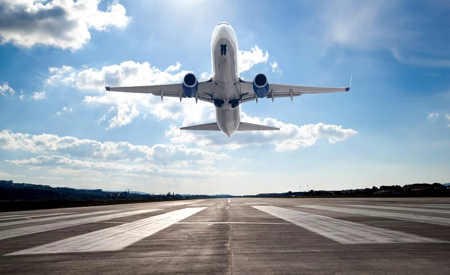 plane taking off from runway