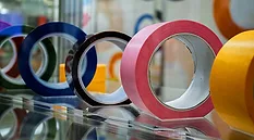 Rolls of tape on a shelf