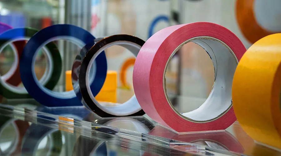 Rolls of tape on a shelf