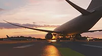 airplane taxing on runway at sunset