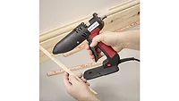 Power Adhesives Tec 810 hot melt applicator Picture of a glue gun