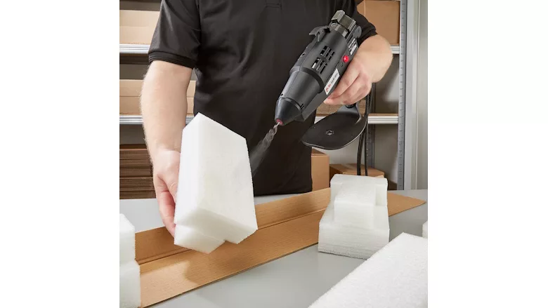 Picture of spray adhesive applied to white foam
