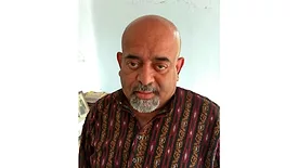 Picture of a man in a brown shirt