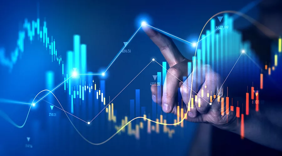 A hand touching a graph.