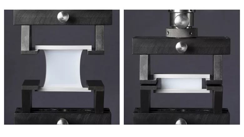 Photo of an adhesive using GENIOSIL STP-E 340 being pulled to test elastic recovery