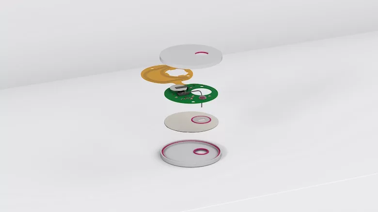 An exploded view of a glucose monitoring sensor