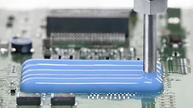 Picture of an adhesive being dispensed