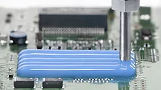 Picture of an adhesive being dispensed